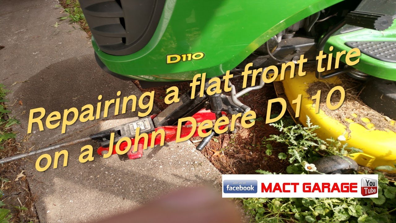 Ремонт проколотой передней шины на John Deere D110