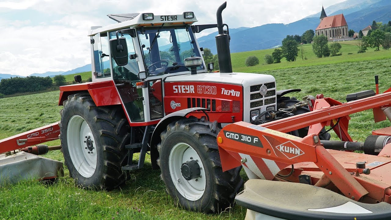 Steyr 8130 Turbo SK2 mit Kuhn Mähkombination