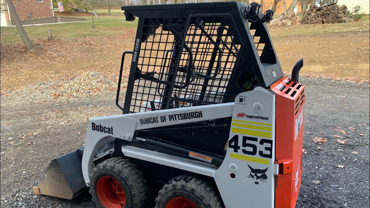 Bobcat 453 - Carrying wood