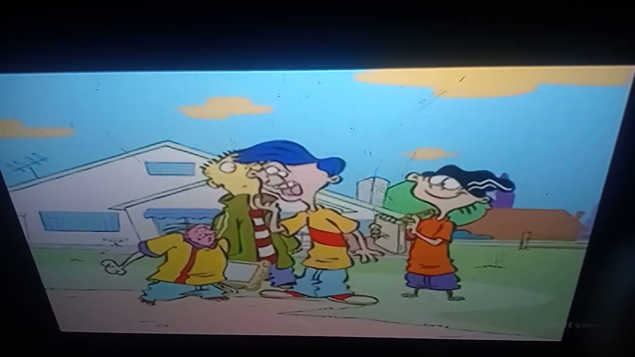 Rolf from Ed Edd n Eddy turns Eddys head into a pimple.