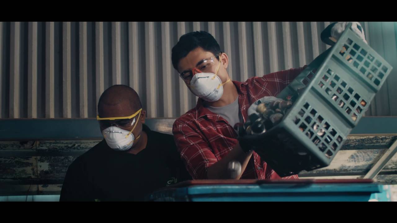 Go behind the scenes with Henry Golding to see how Nespresso capsules are recycled in Singapore