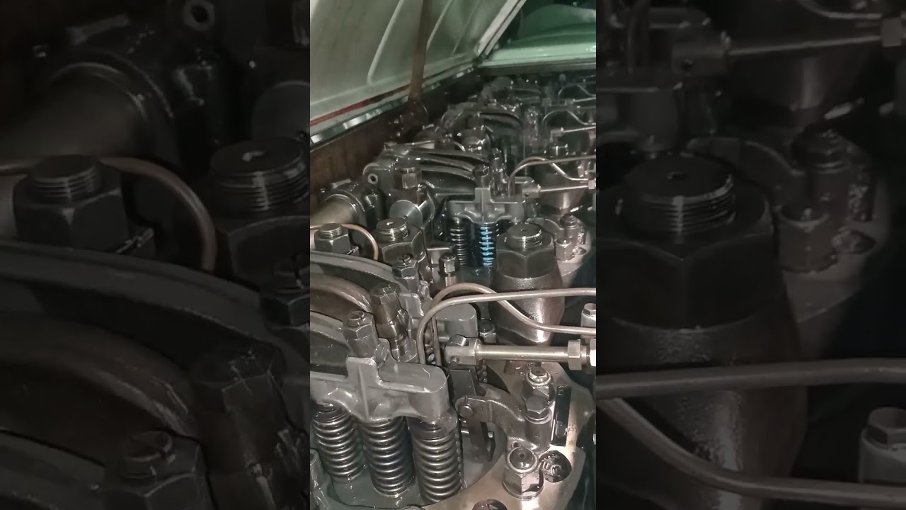 EMD 16- 645E, two stroke diesel engine, opened valve cover, running