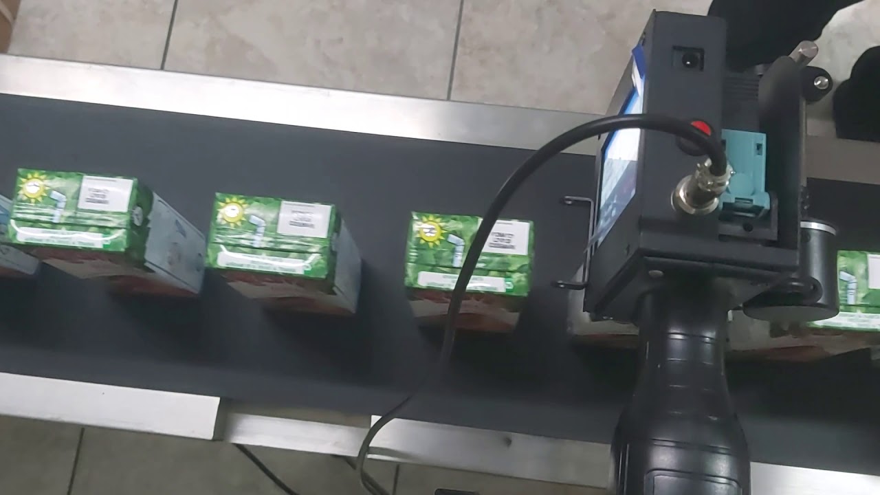 Equipo Codificador Fechador de Tetrapack Autom&aacute;tico en Faja Transportadora CODEMARK LIMA-PERU