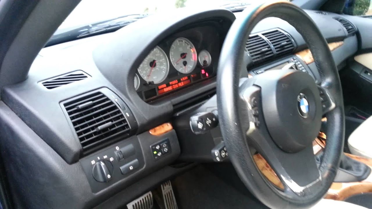 2004 BMW X5 4.8is, LeMans Blue Metallic/Cream Beige