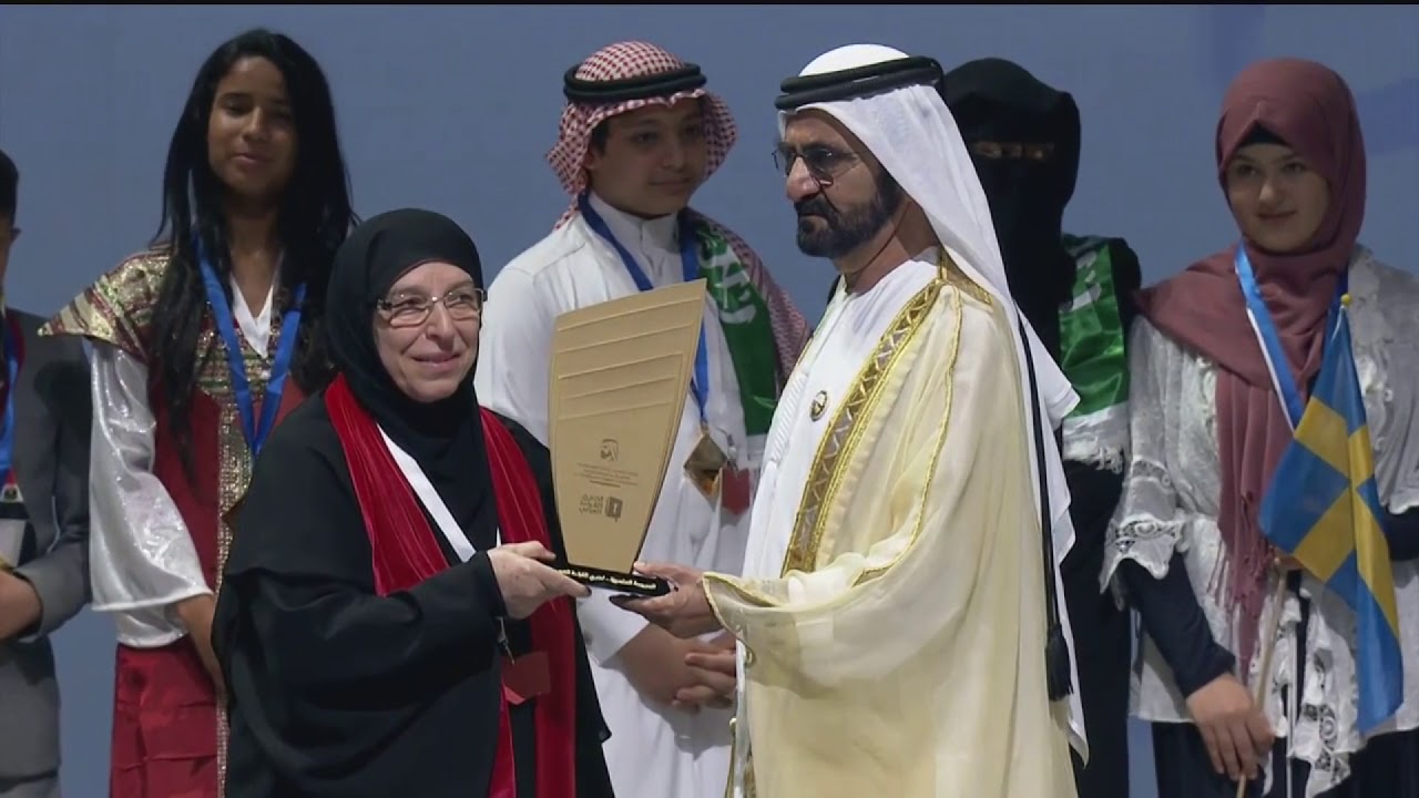 الإعلان عن فوز اﻹيمان - بنات  بجائزة تحدي القراءة العربي 2017