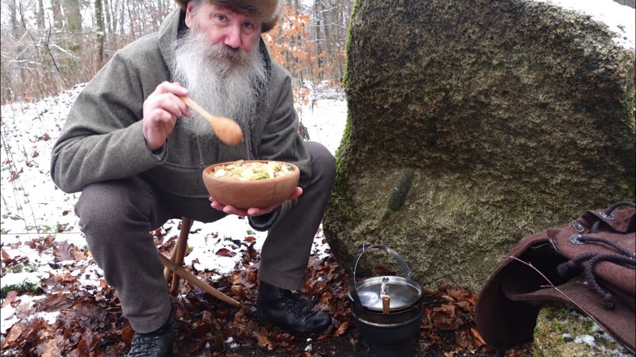 Onion soup cooked in Muurikka pot, outdoor trip in snowy winter landscape