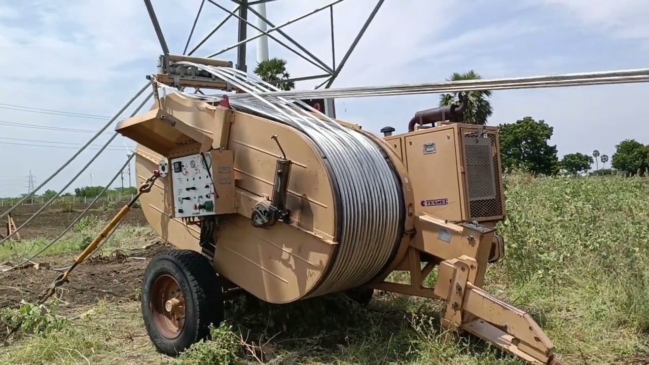 Transmission line 400 kv line stringing work and conductor drum paygout tensioner machine and puller
