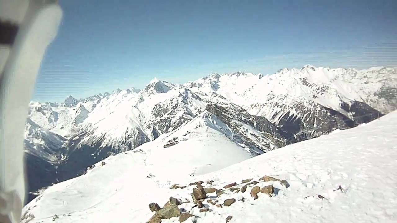 Russia, Dombai. Contour HD Snowboarding Musa-Achitara 3002m outside of ski-track, march 2011