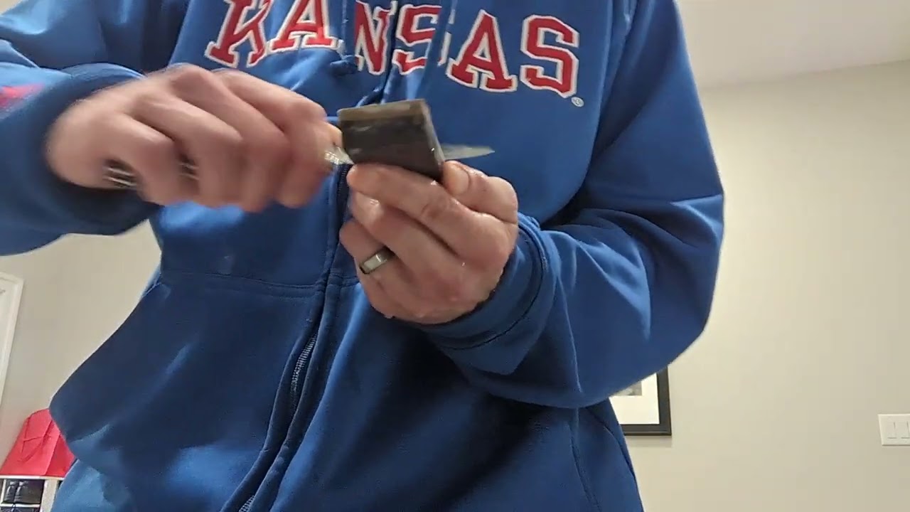 sharpening pocketknife on coticule
