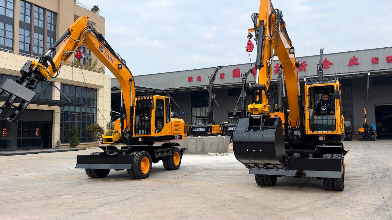 Tl150s Wheel excavator with log gripper 