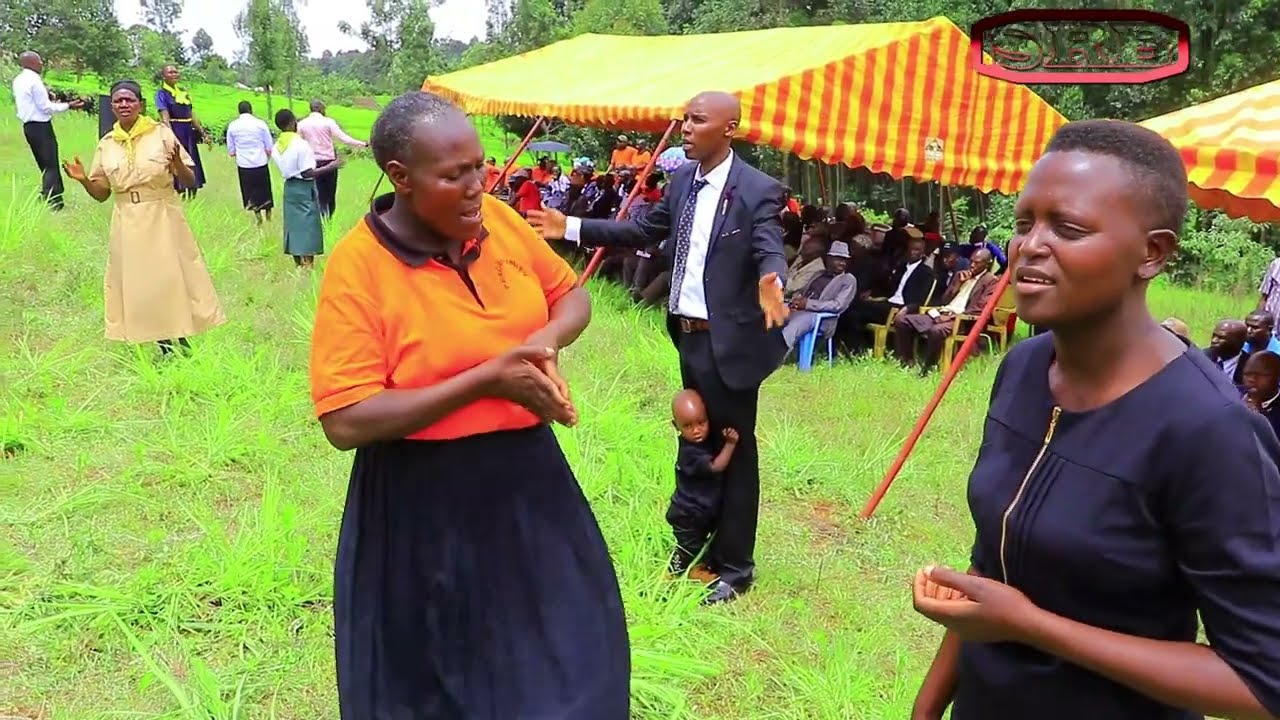 ERONGE SDA performing during mzee oteki funeral