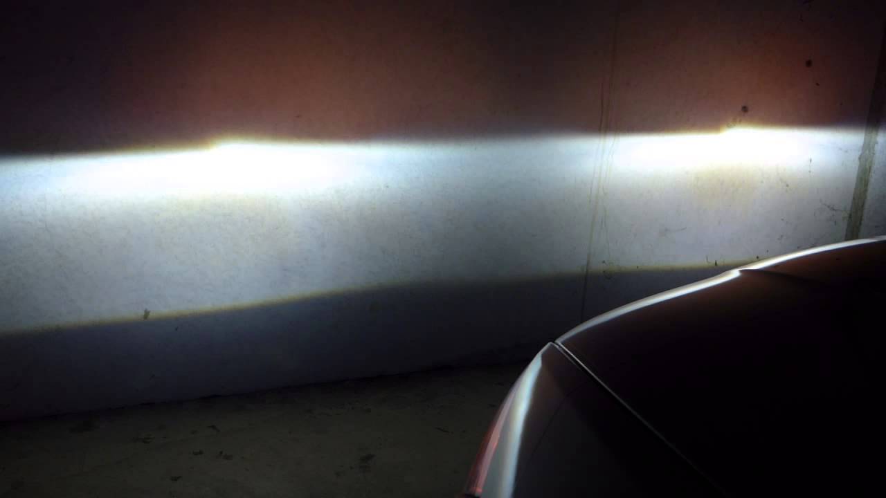 BMW 135i with AHL EU coding for headlights. - bulb pattern on garage wall...