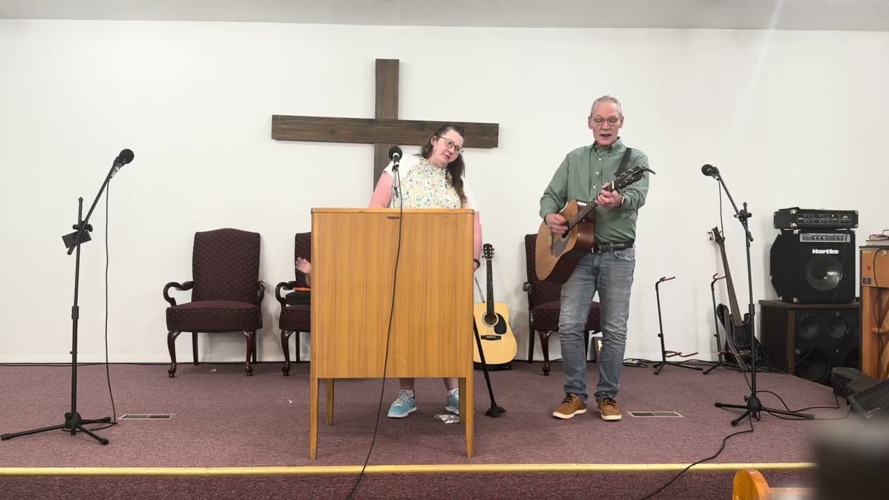 Brother Kevin and sister Angie singing 