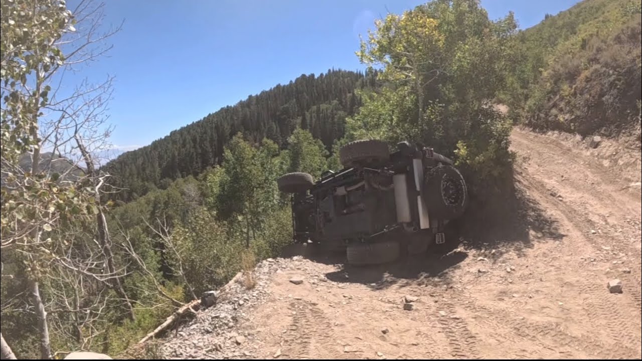 JK Wrangler rolls and slides inches from the edge