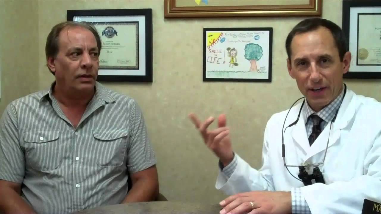 Overdentures using natural teeth to support a full denture. An innovative technique