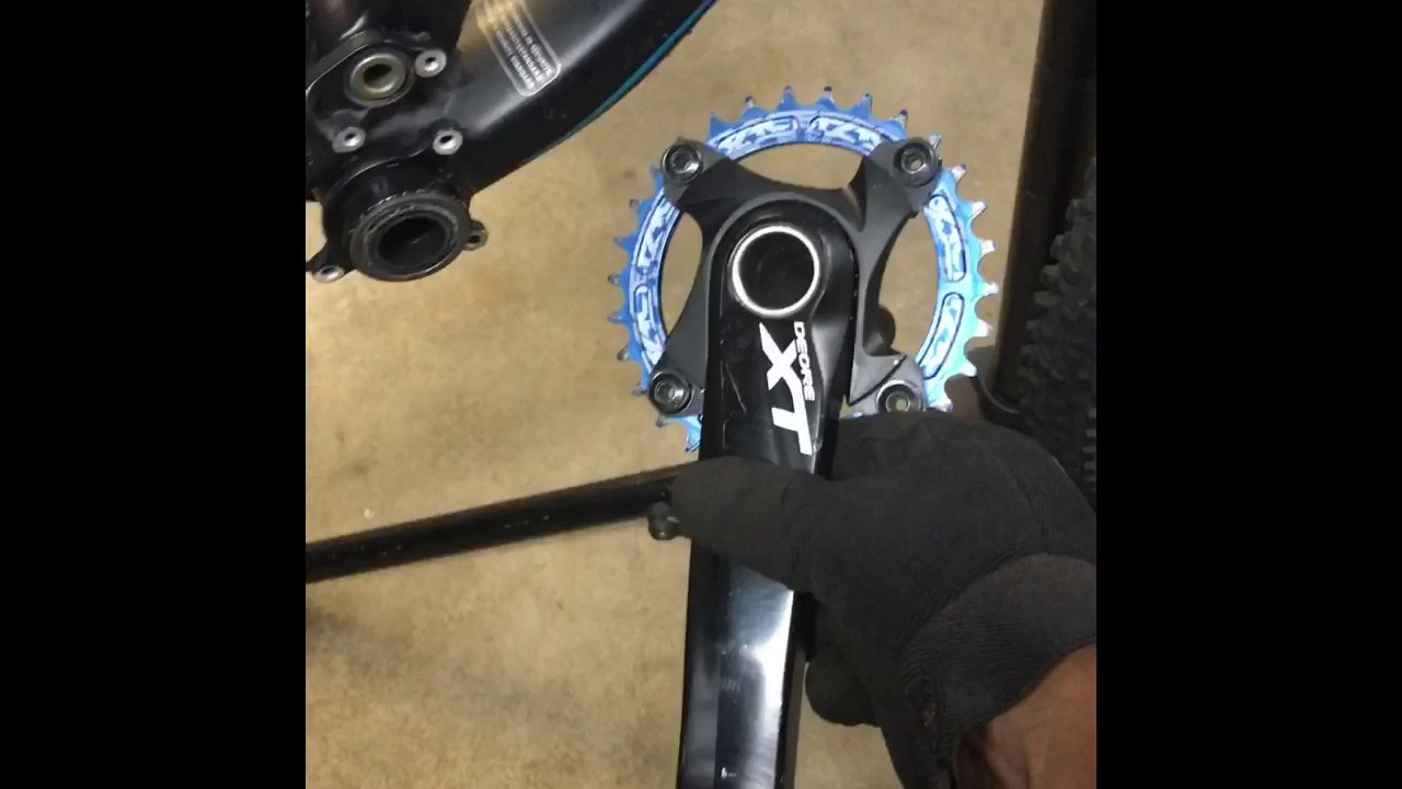 Install Oneup Components 30T oval chainring 104 BCD
