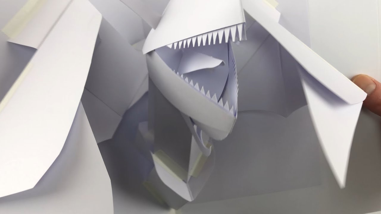 Pop-up dragon with expanding wing mechanisms (first try)