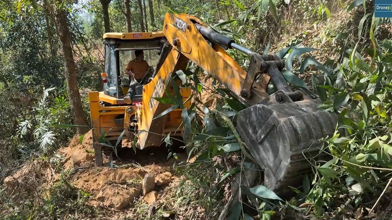 New Mountain Road Project Connecting Villages, Farms & Jungles – JCB Backhoe