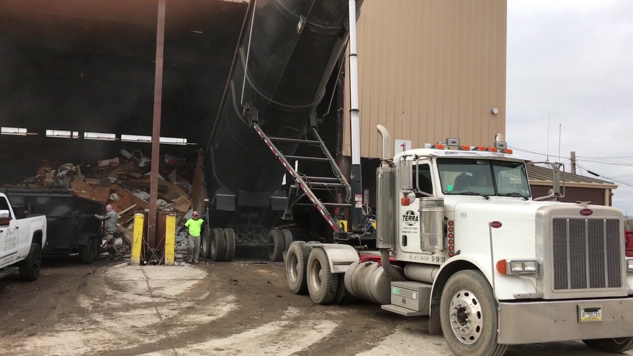 AWESOME 100 Yard Demolition Dump Truck dumping at Transfer station  from Demo job
