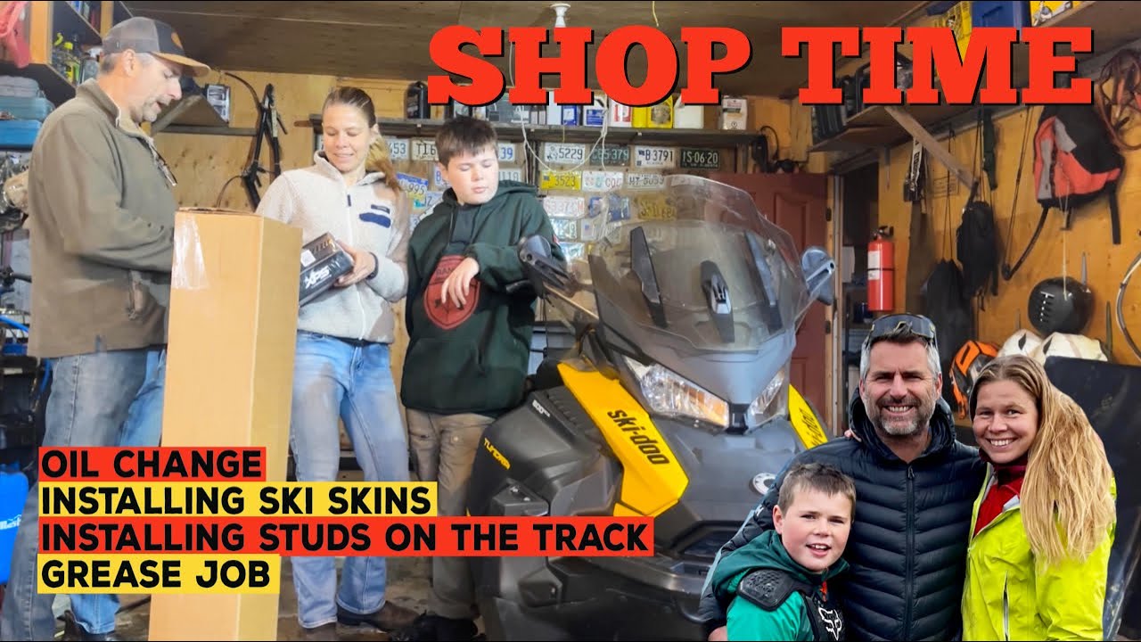 Getting our snowmobiles ready for winter. Oil change, ski skins, track studs and greasing.