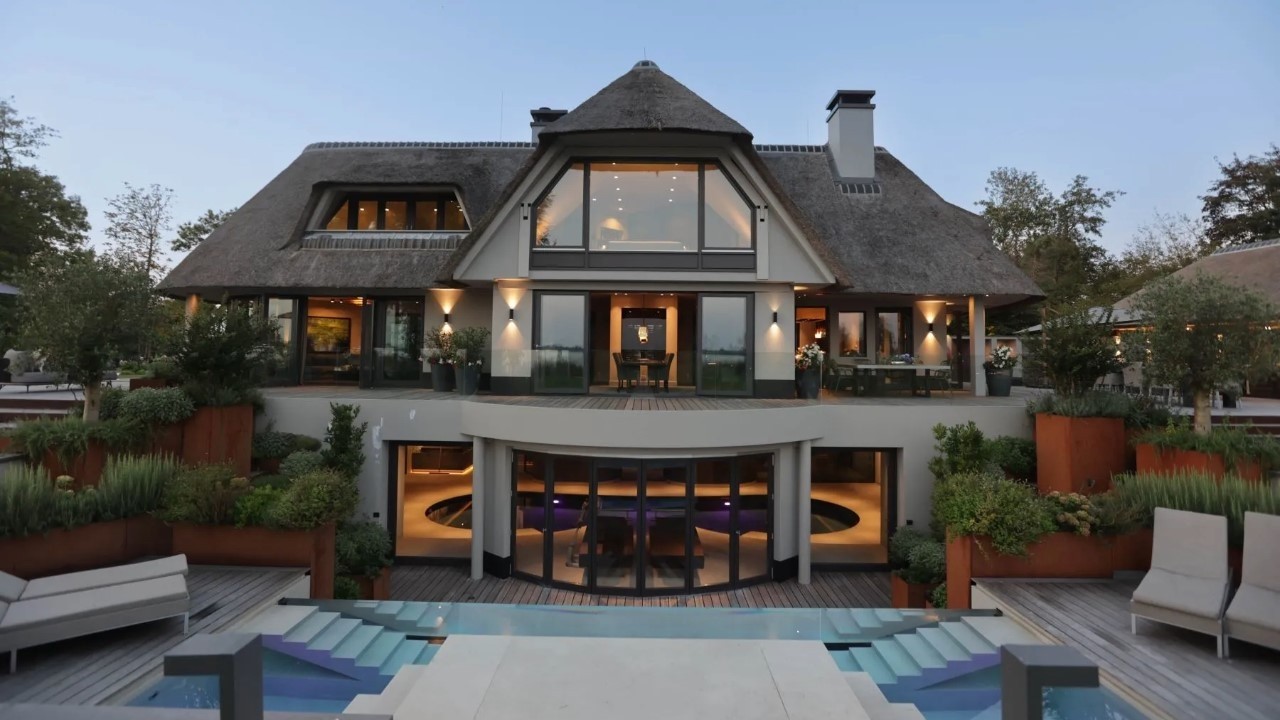 World-Class Waterfront Mansion with Indoor + Outdoor Pools | Loosdrecht Estate
