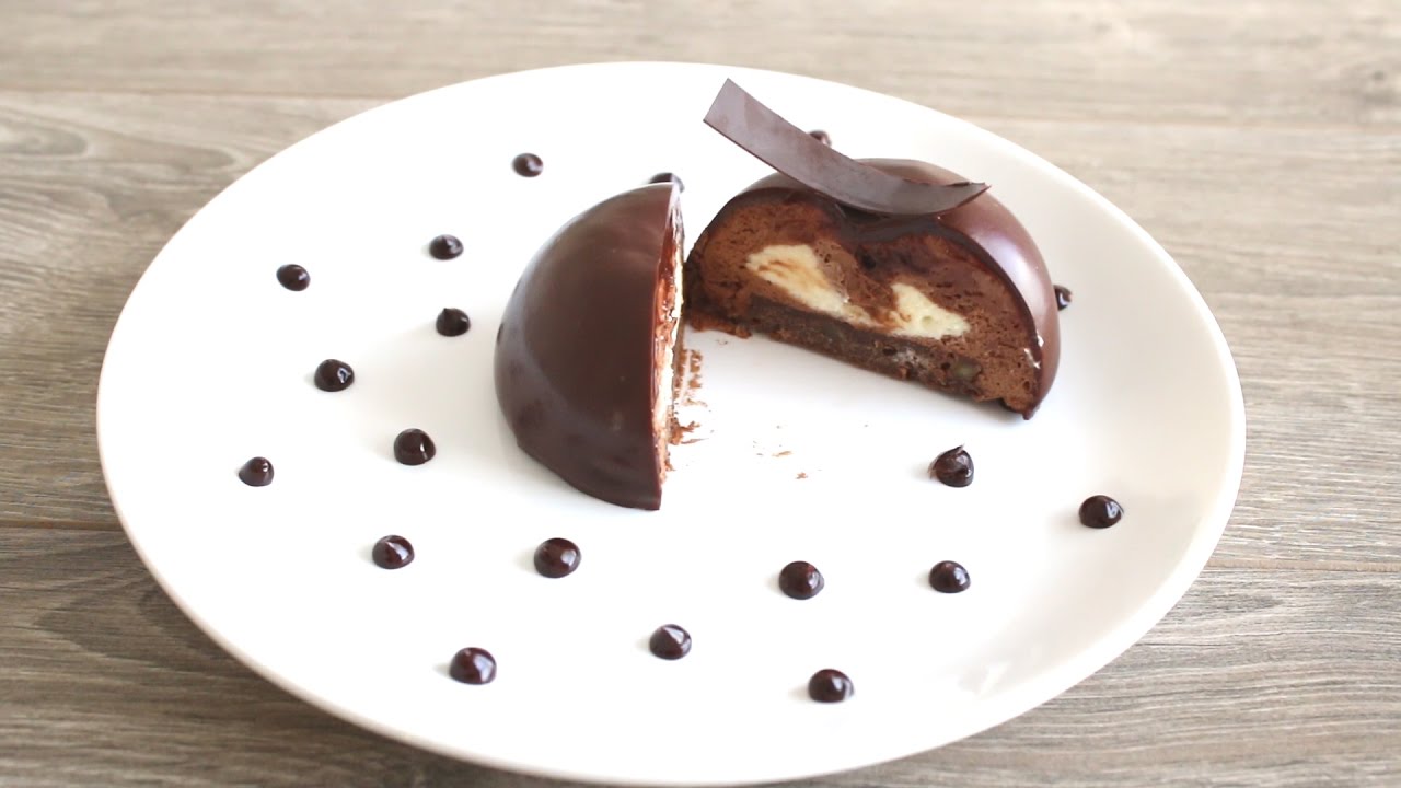 Double chocolate mousse dome cake with chocolate glaze