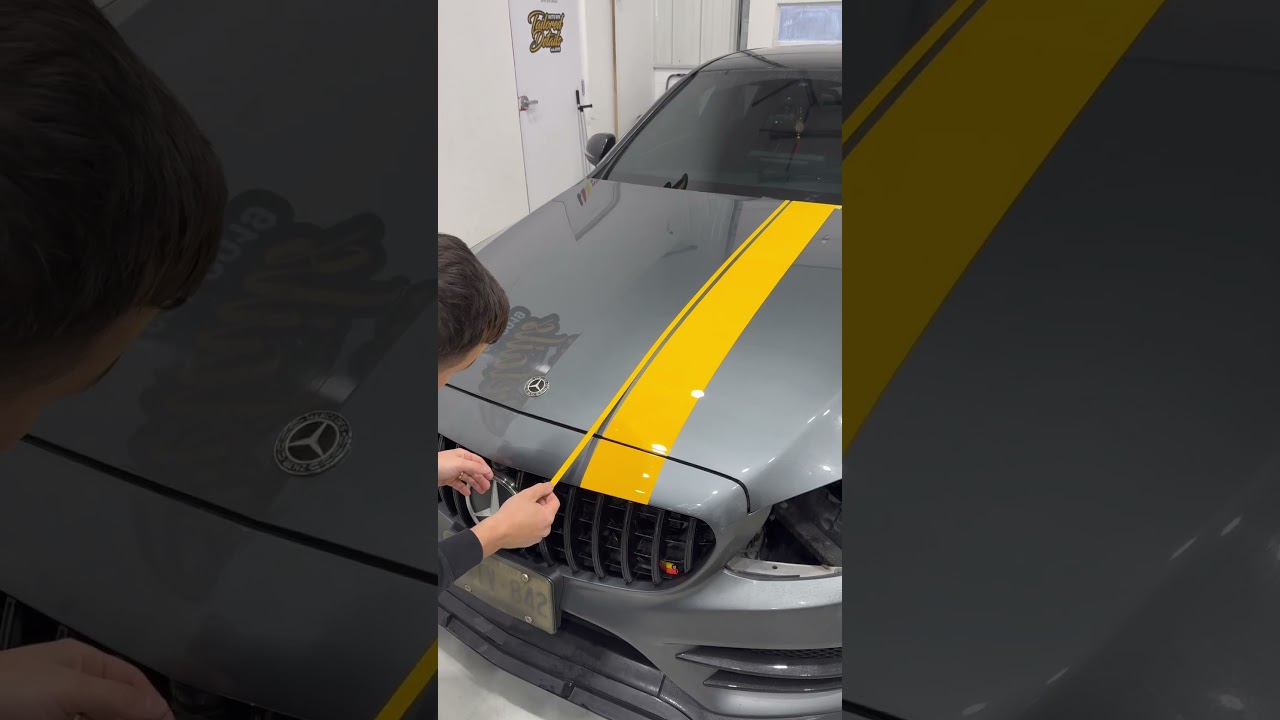 Mercedes Benz getting custom Yellow AMG Stripes done, what you guys think of the new look?