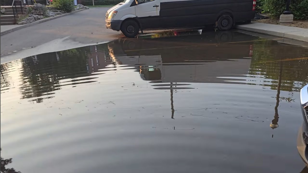 “Beautiful Sunset Flood – Parking Lot Drain Cleared!”