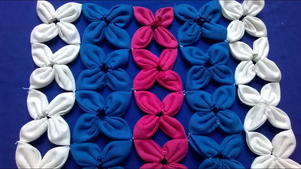 TAPETE DE FLOR DE FUXICO