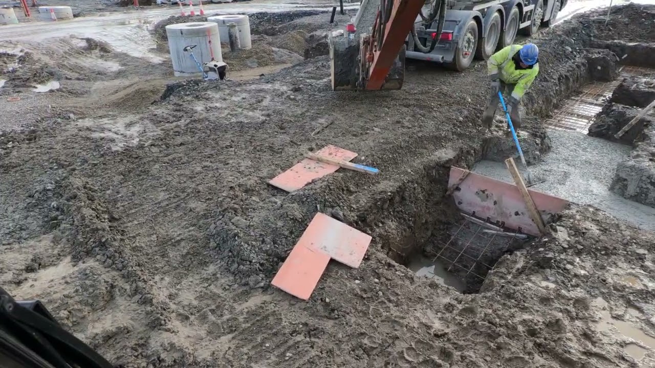 Pouring concrete footings 900x300mm + due to the weather caving the trenches