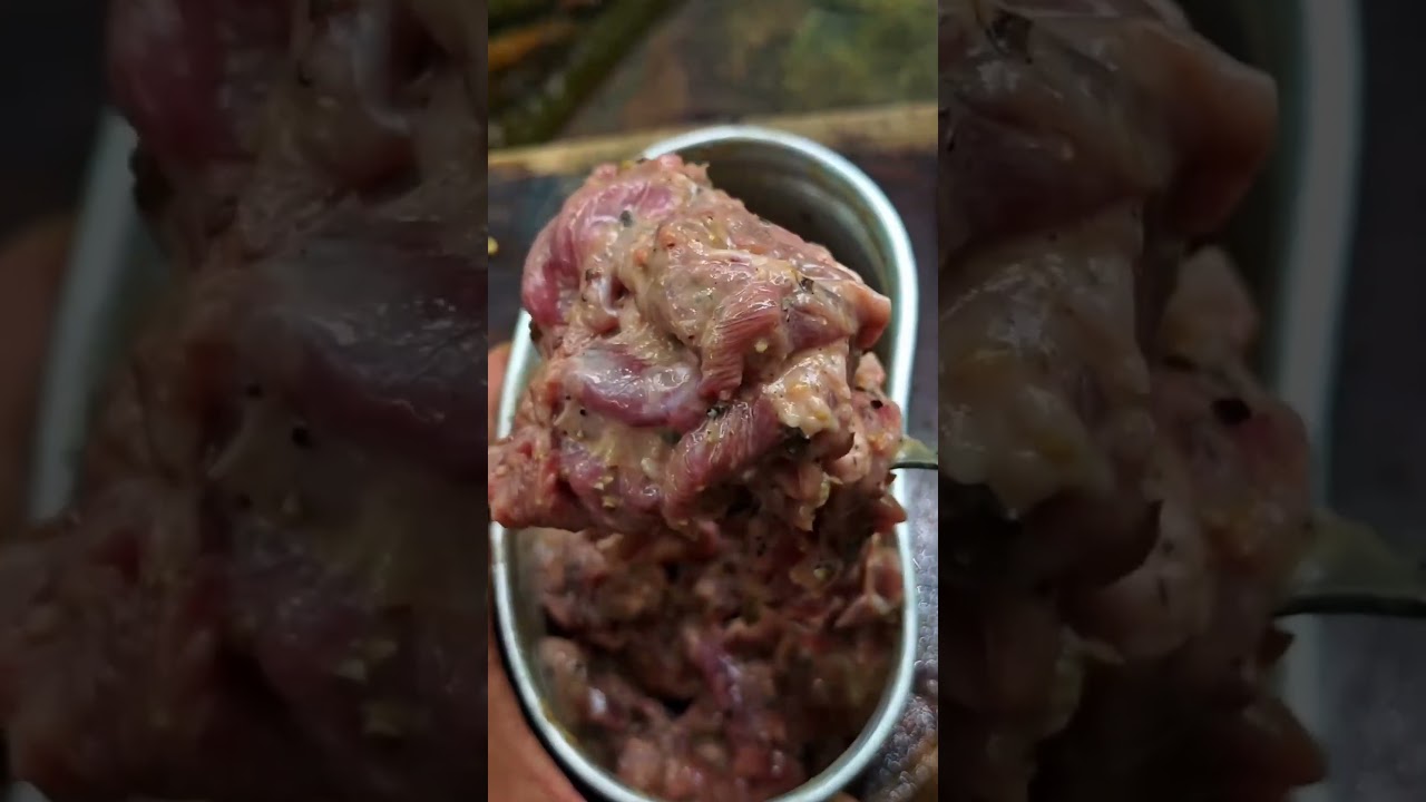 Stewed meat in a pot. Cook...