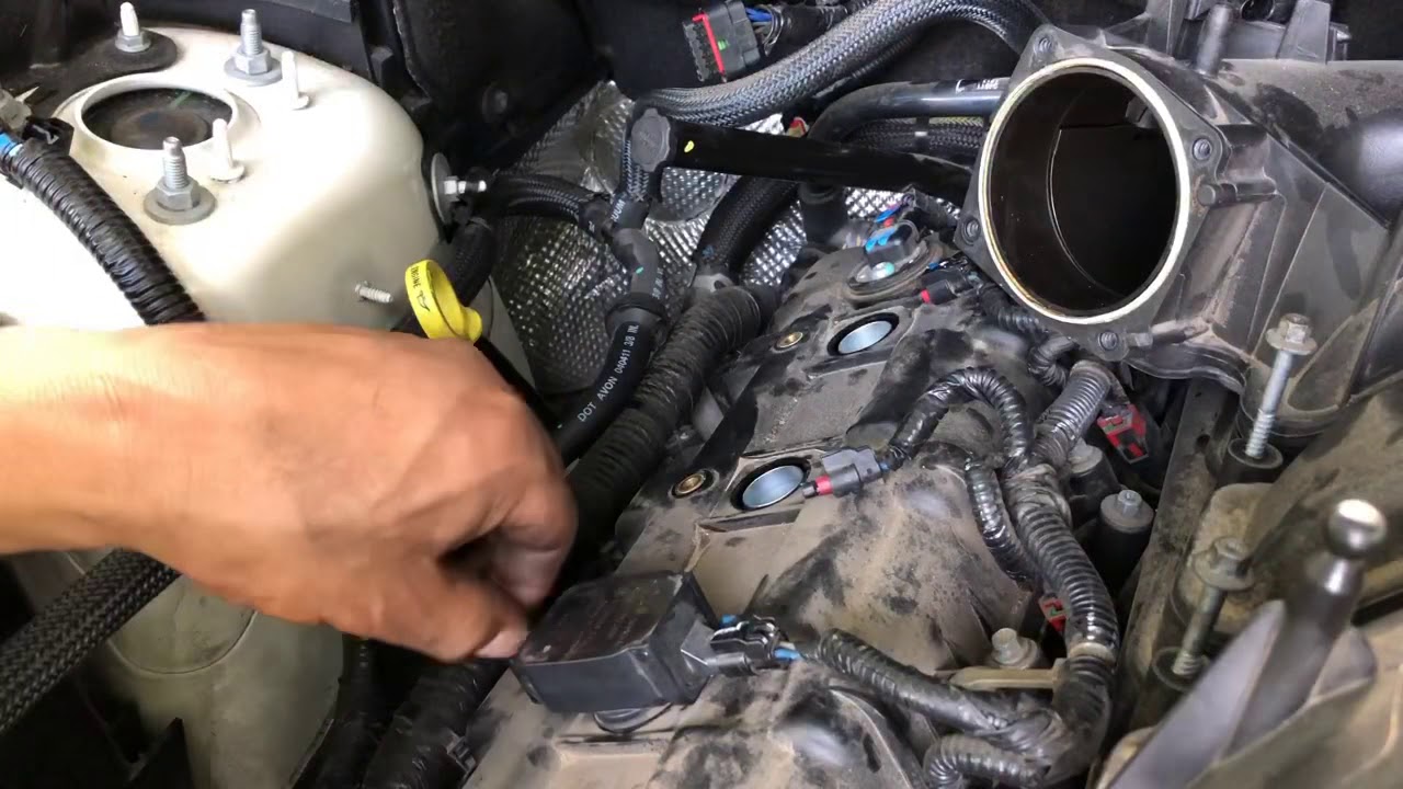 Cómo reemplazar a las bujías de un 2011 Jeep Grand Cherokee