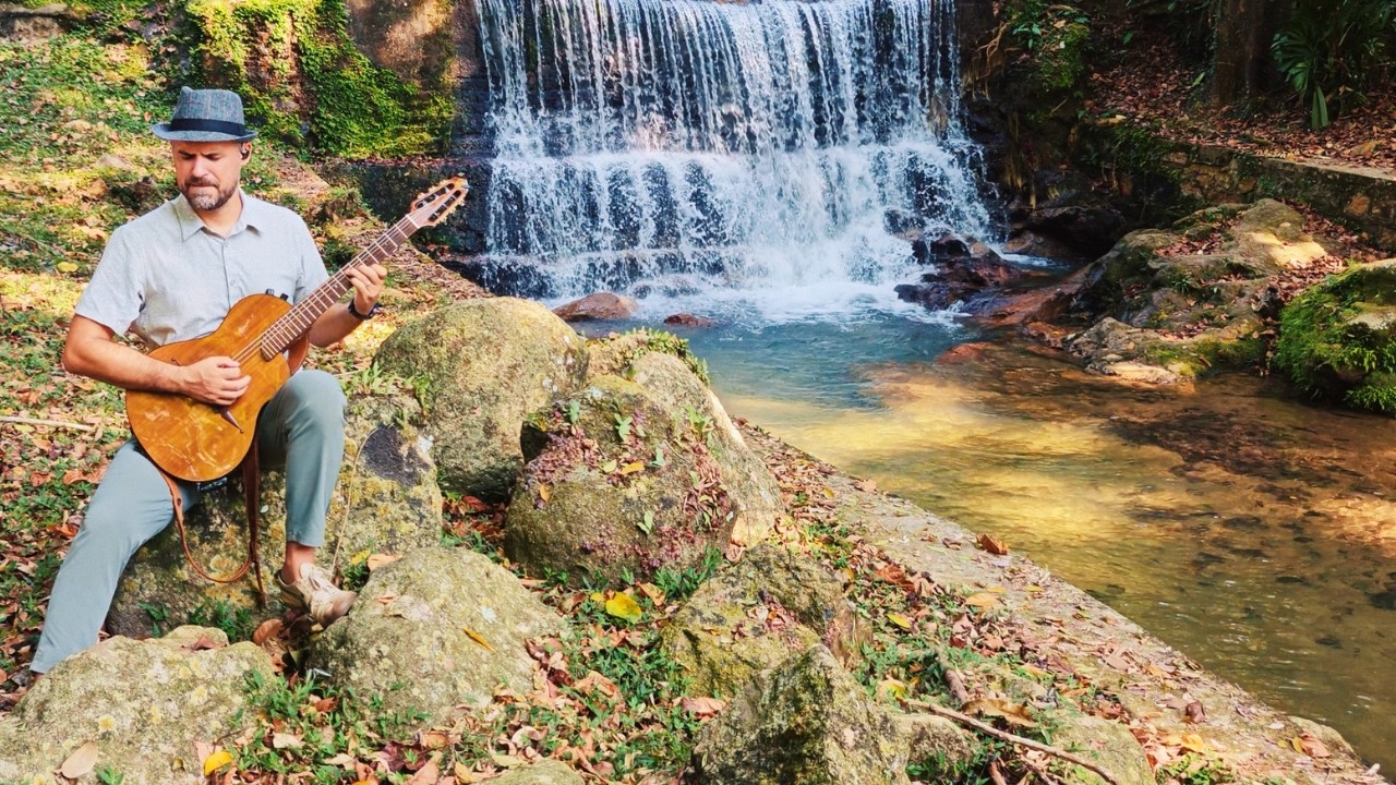 Deep focus with real nature. 45 minutes of waterfall guitar meditation for work that matters.