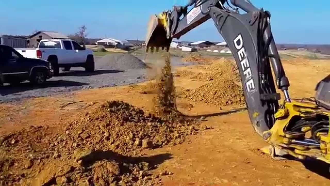 Digging Post Holes with a Backhoe