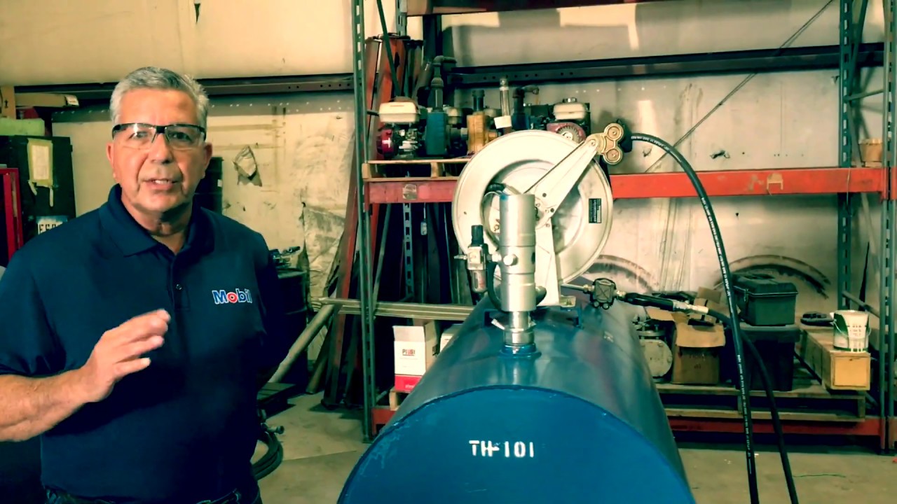 Gary talks about a Hampel Oil lube tank equipped with pump, hose reel, gauge, and prevent fill cap.