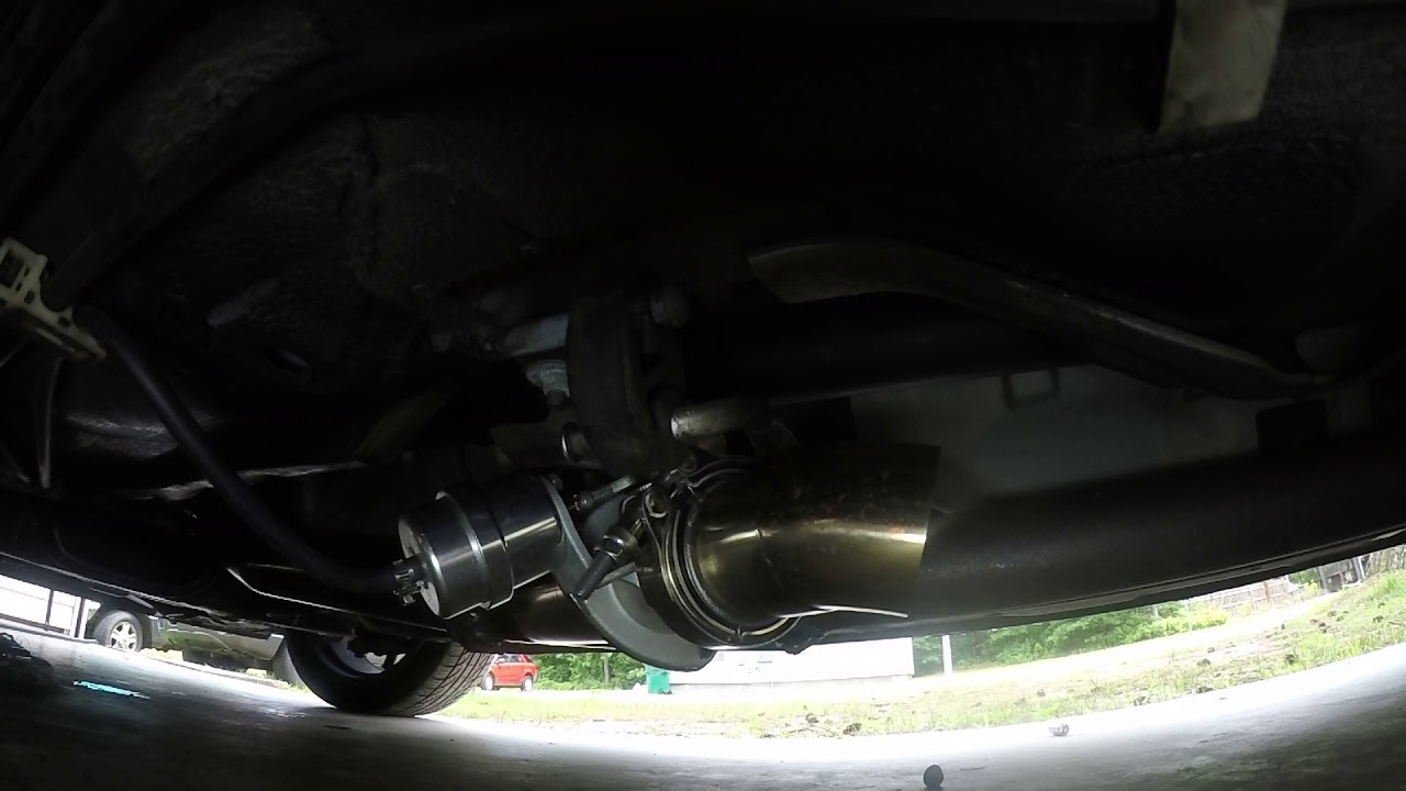 Vacuum actuated exhaust cutout