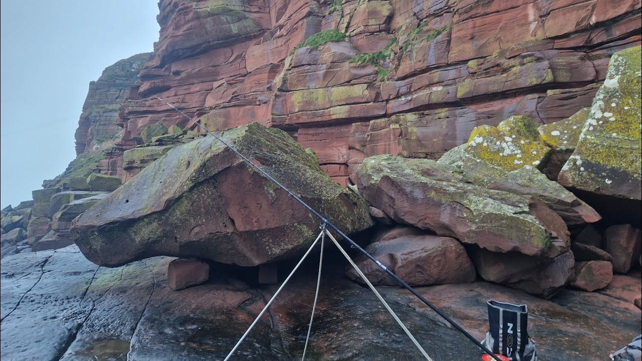 fishing a big cliff mark for West coast cod. (my last session)