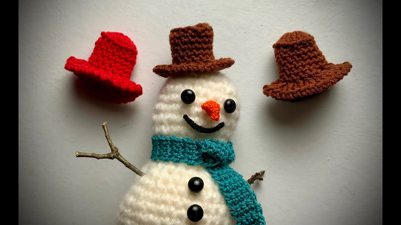 Einen kleinen Hut 🎩 z. B.: für einen Schneemann häkeln