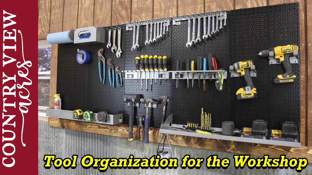Getting the Workshop Organized with OmniWall Steel Pegboard.  Not your traditional pegboard system.