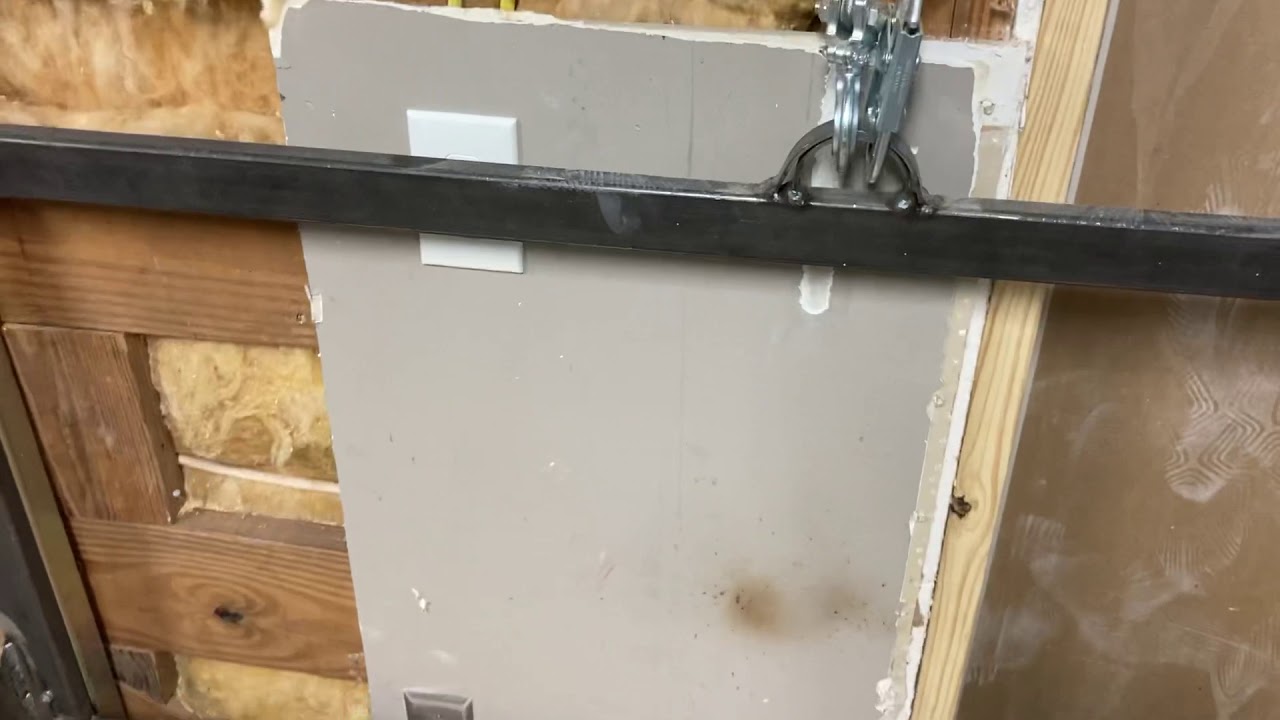 Garage elevator / lift and work shop partition from garage