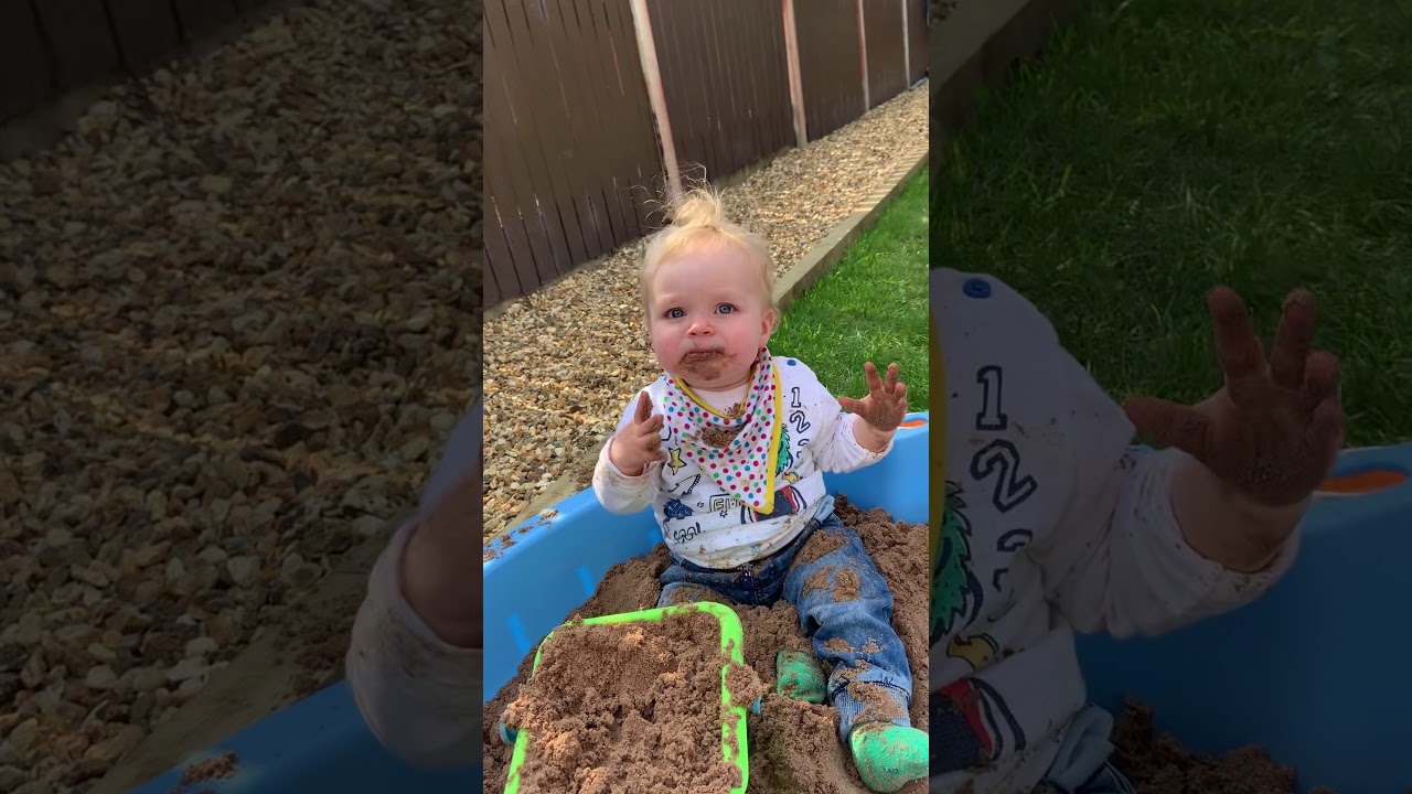 Oscar eating sand!