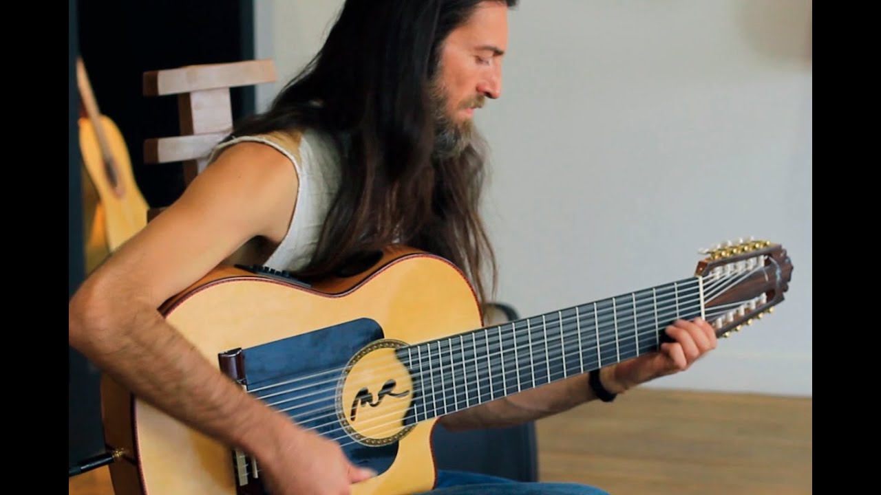 Estas Tonne plays his new 10 string guitar for the first time