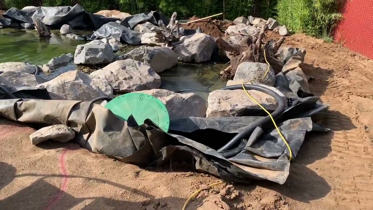 Quick Pond Update: Broken Excavator, Pond Leaks, and Boulder Coffee Tables, Oh My!