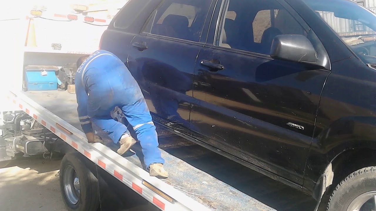 Como subir  una camioneta a una grua