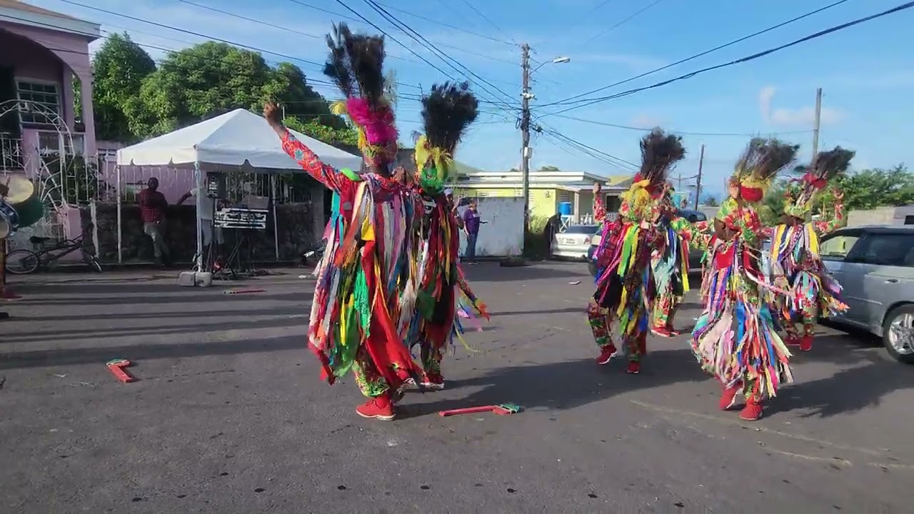 Valons International Masquerade group performing over Cayon for the Caesars