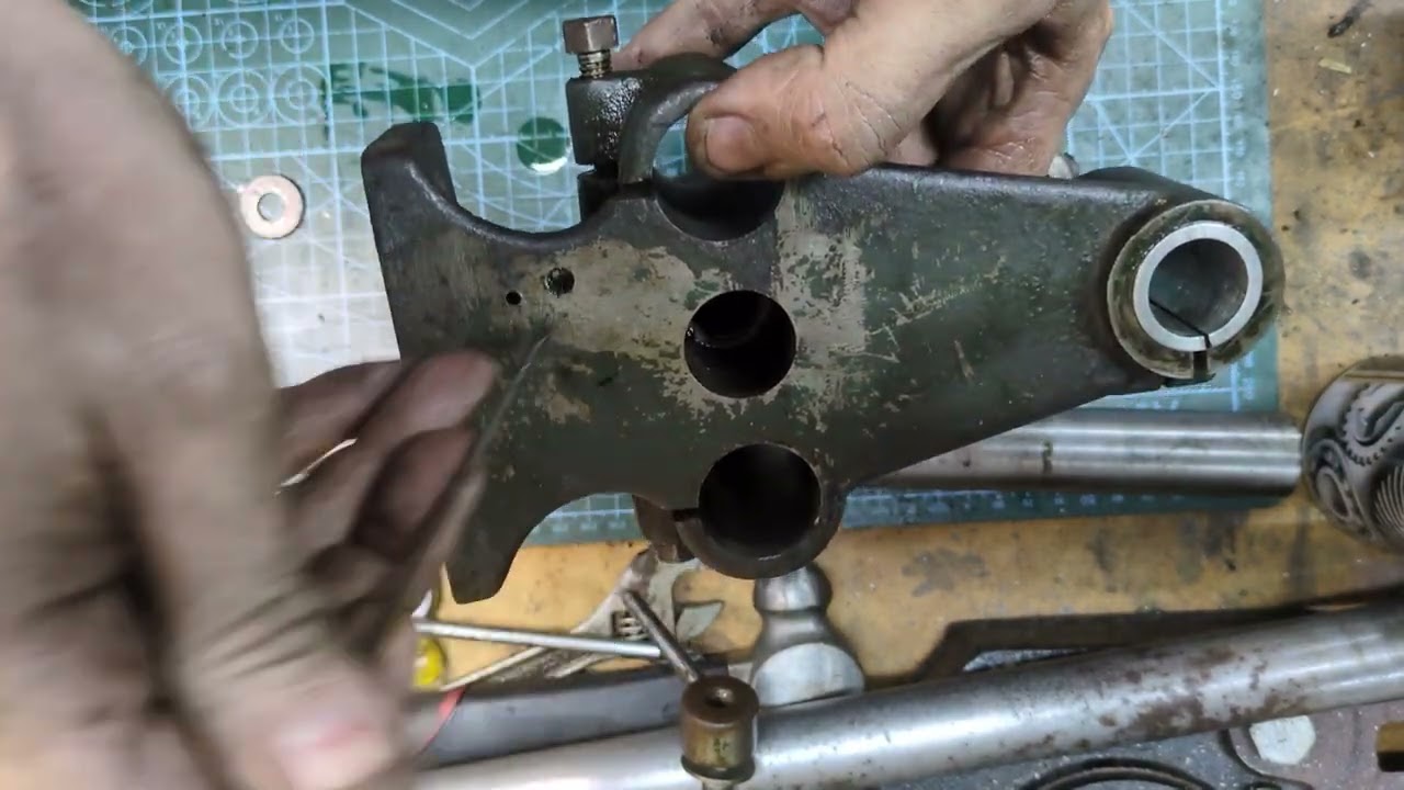 Burden, Hercus 3.5 Lathe . Investigating moving then leadscrew back to in-between the bars