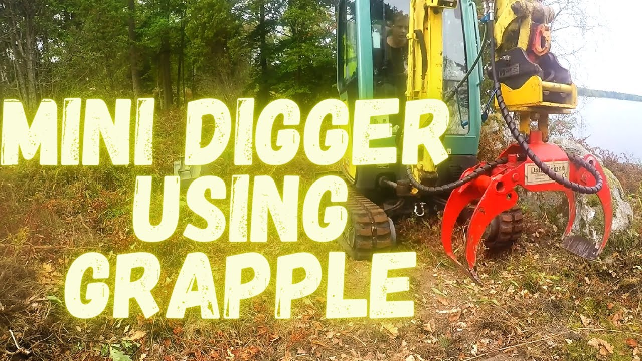 Removing oak plants with a Yanmar SV17 ex mini digger using a grapple