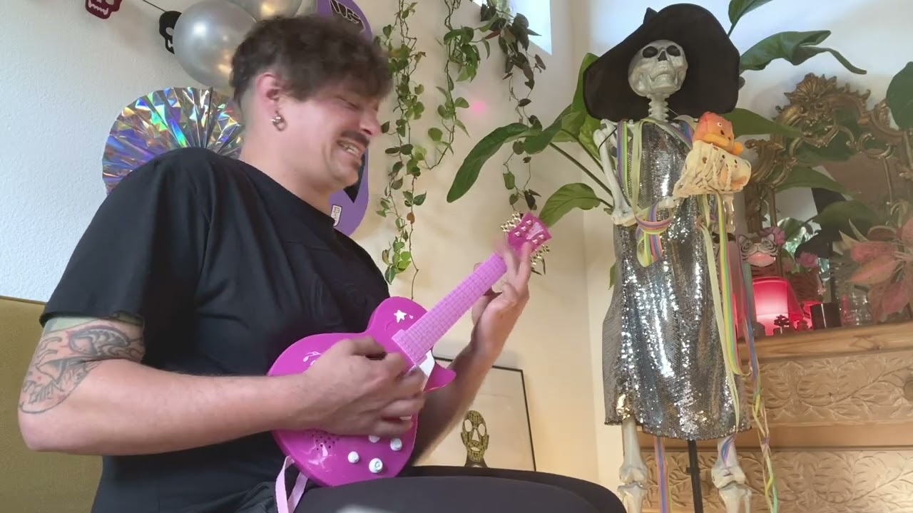 Pink Plastic Guitar (TIZIZIT Theme)