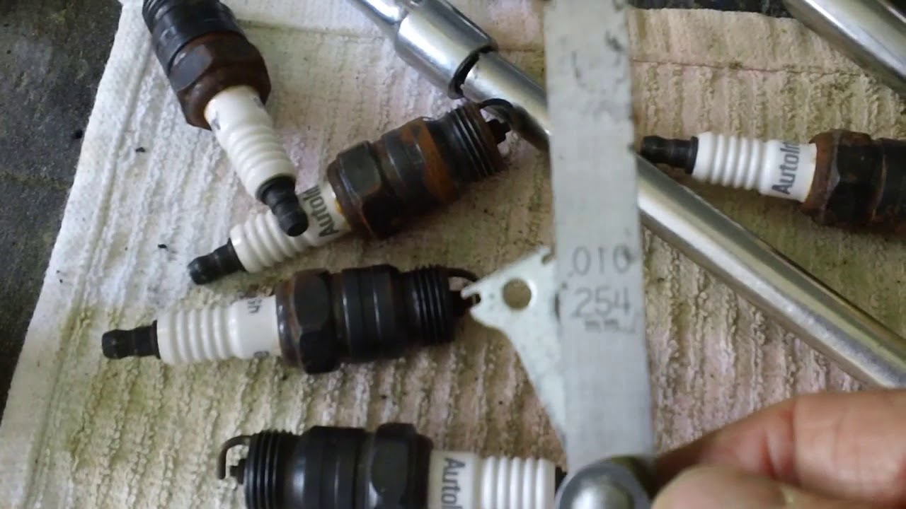 1966 Ford Thunderbird repair and refurbishment (Part 5). Spark plugs & new trunk lid weather strip.