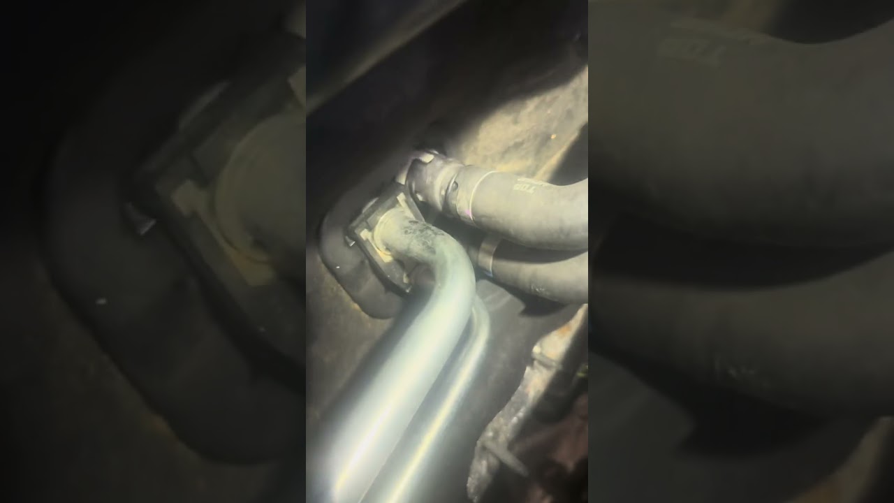 Replacing heater hoses on a Volvo S40.
